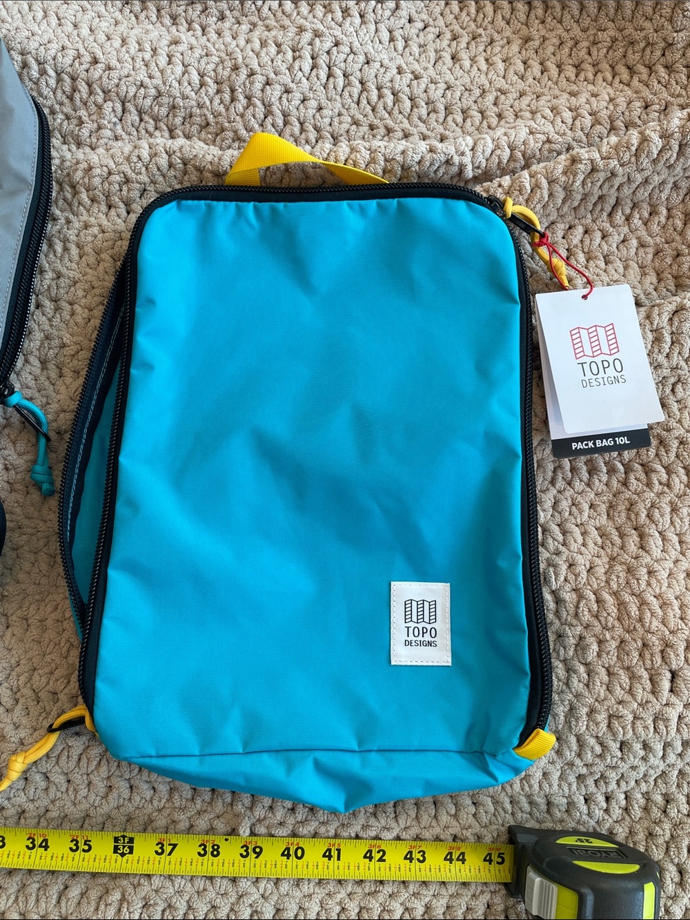 Topo Designs Gray & Black
CARVANA Travel and Daily bag with Turquoise Accents - Picture 10 of 13